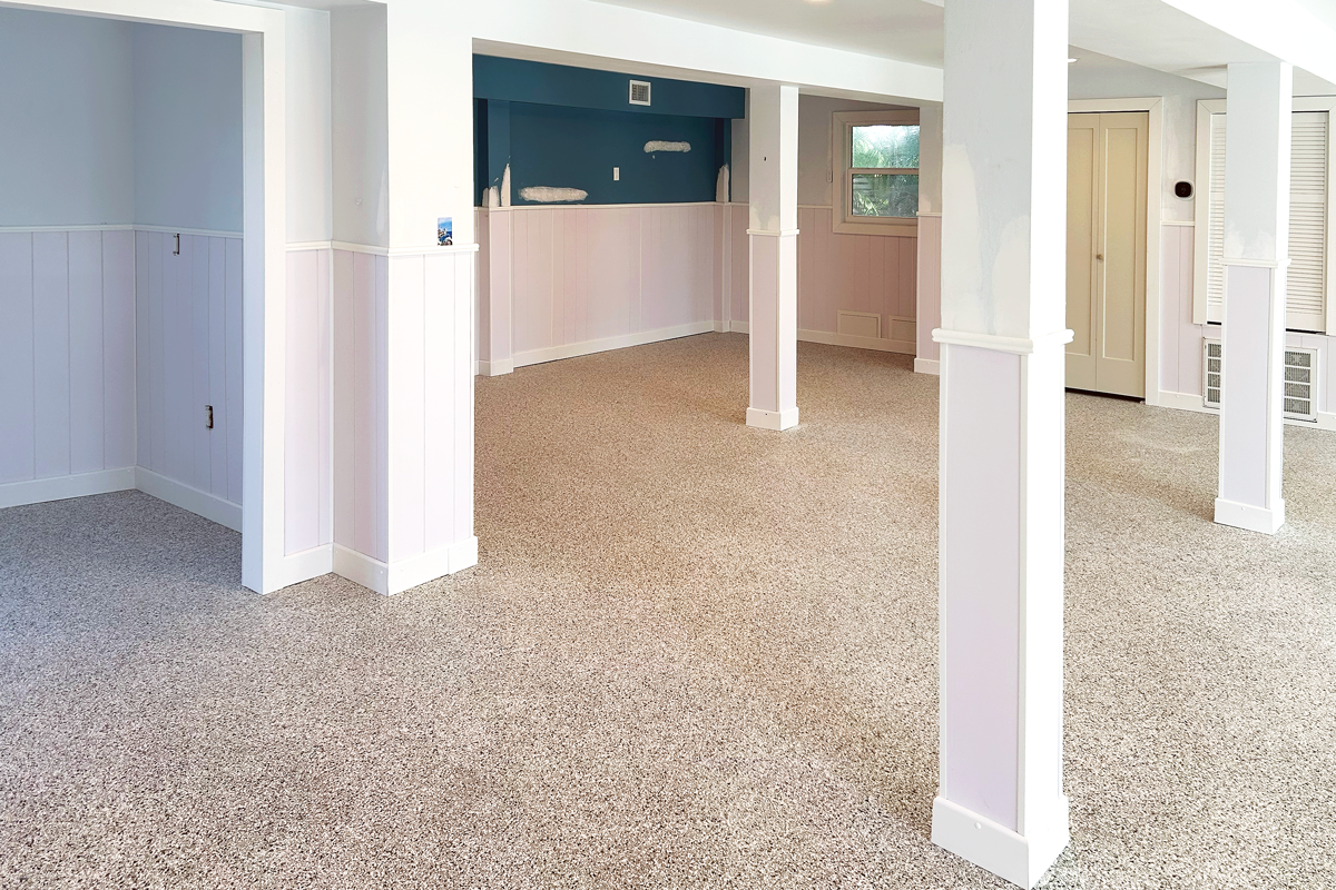 Waterproof wall and trim installed in a room.